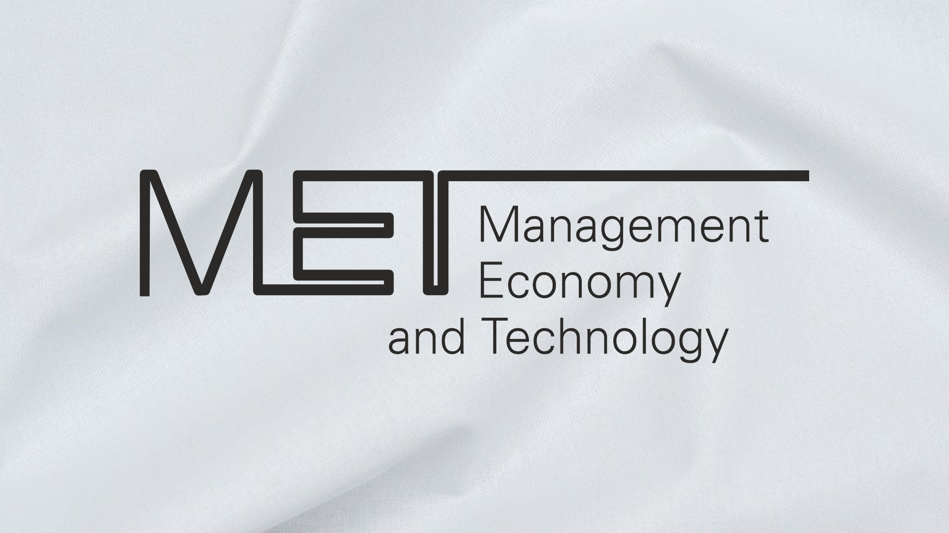 Logo MET: Management, Economy and Technology. Czarny napis na białym tle.