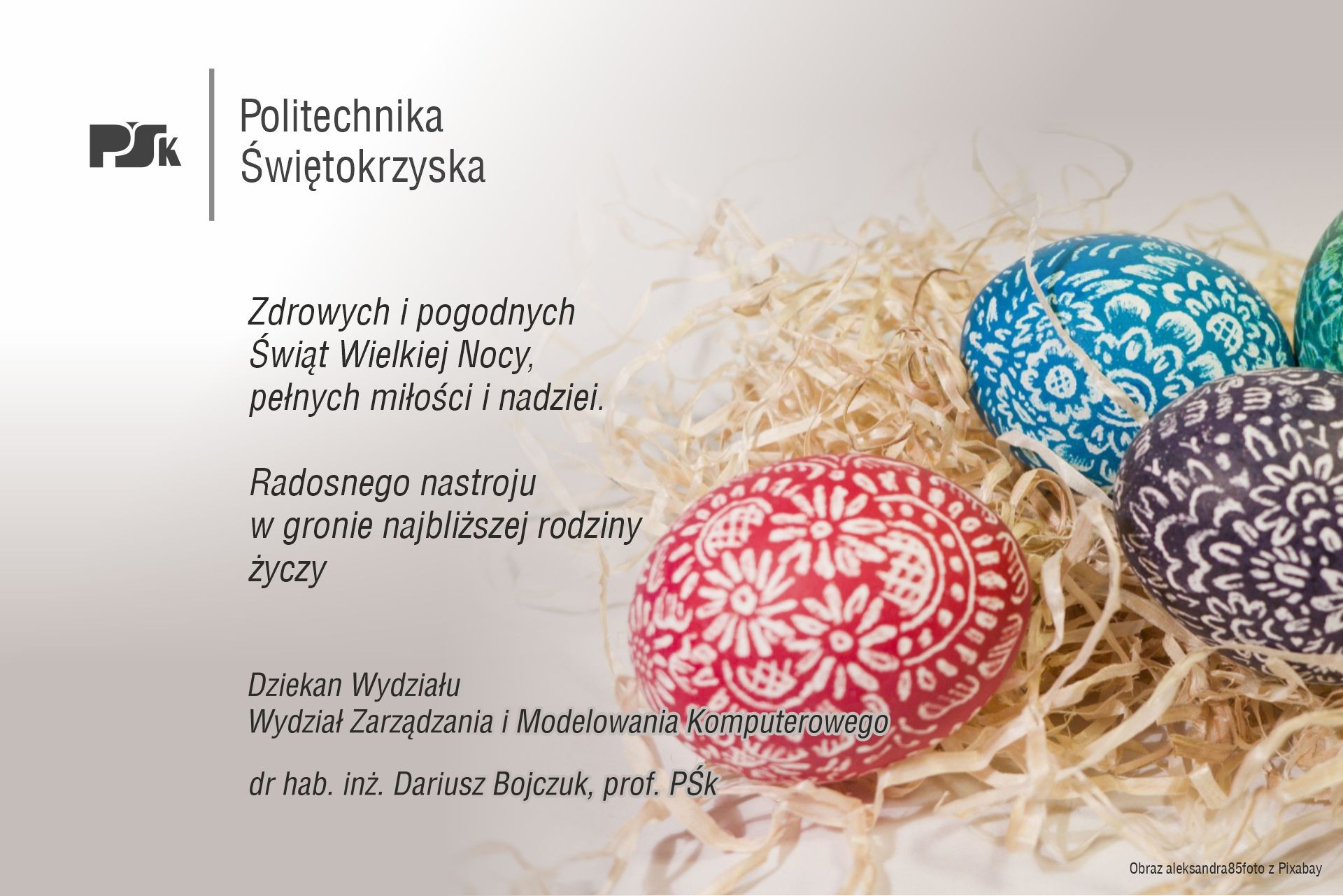 Wielkanocne pisanki w ozdobnych wzorach, na tle słomy. Tekst życzeń od Politechniki Świętokrzyskiej.